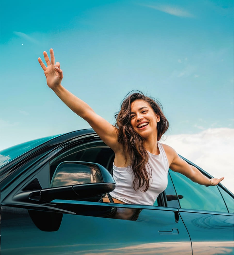 Caranty Car Rental Corfu Happy girl in a car
